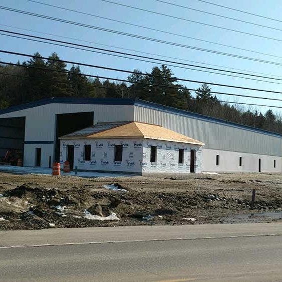 Demillo’s Boatyard photos. This 80x150x 23’ high building was erected right through the winter. Our crew braved the weather and still beat the budget.